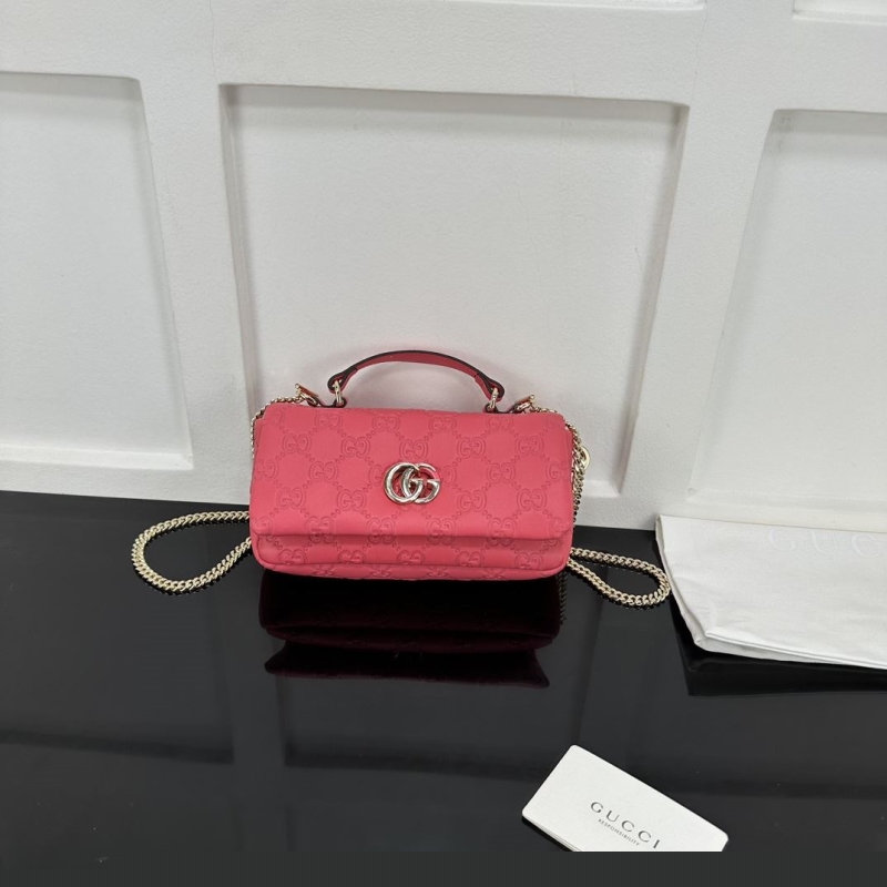 G*u*i top handle bags